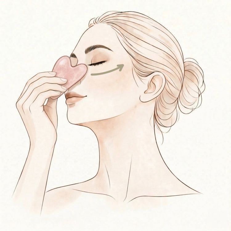 Illustration of a woman touching her under eye with a pink gua sha on a light beige background.